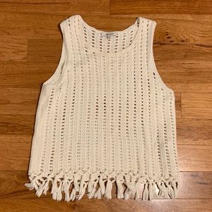 Cream knit tank top with tie detailing at bottom